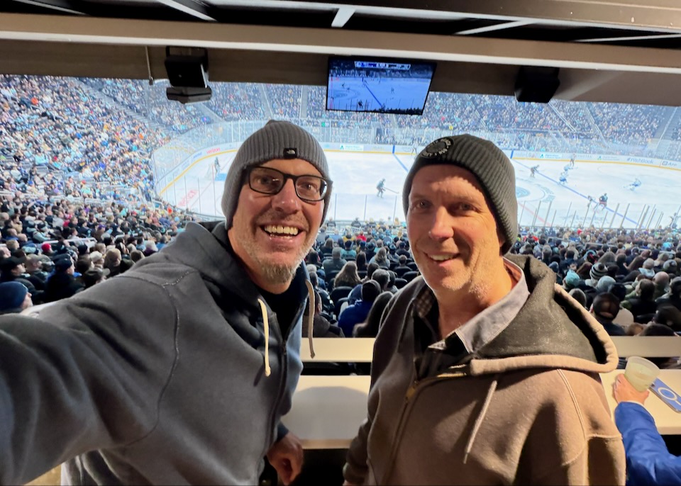 My brother and I at a Seattle hockey game.